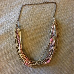 Gold/pink. Med-length necklace.